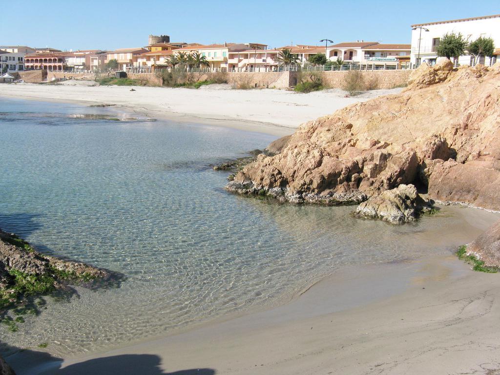 Borgo Spiaggia Vista Mare Isola Rossa Exteriör bild